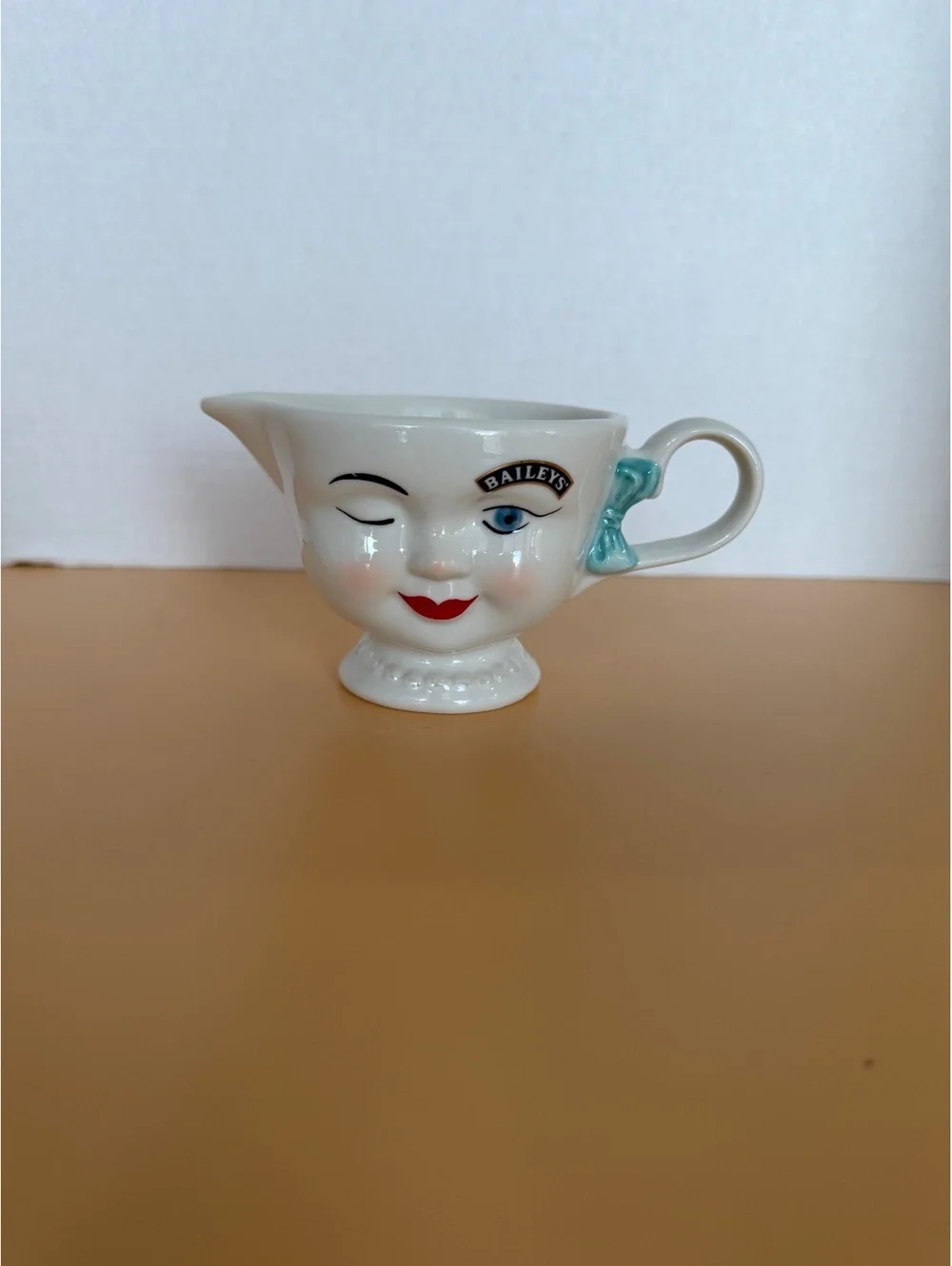 Baileys Ceramic Creamer Pitcher with Winking Face Design